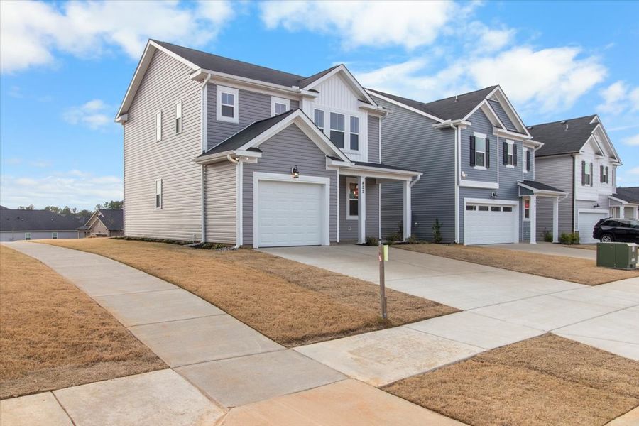 Front exterior of a new home in Windsor, North Augusta, SC, highlighting curb appeal (Image 16).