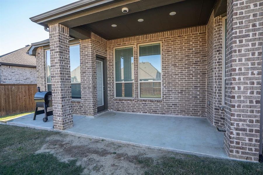 Covered & extended back patio.