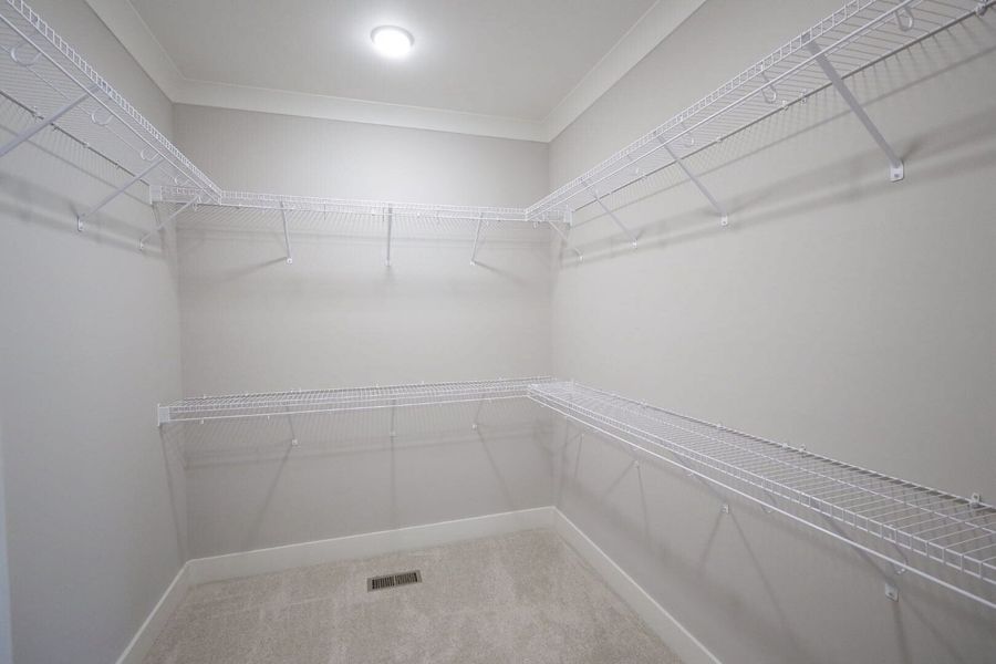 Spacious, unfurnished interior of a new home in Baker Road, Birchwood (Image 47).