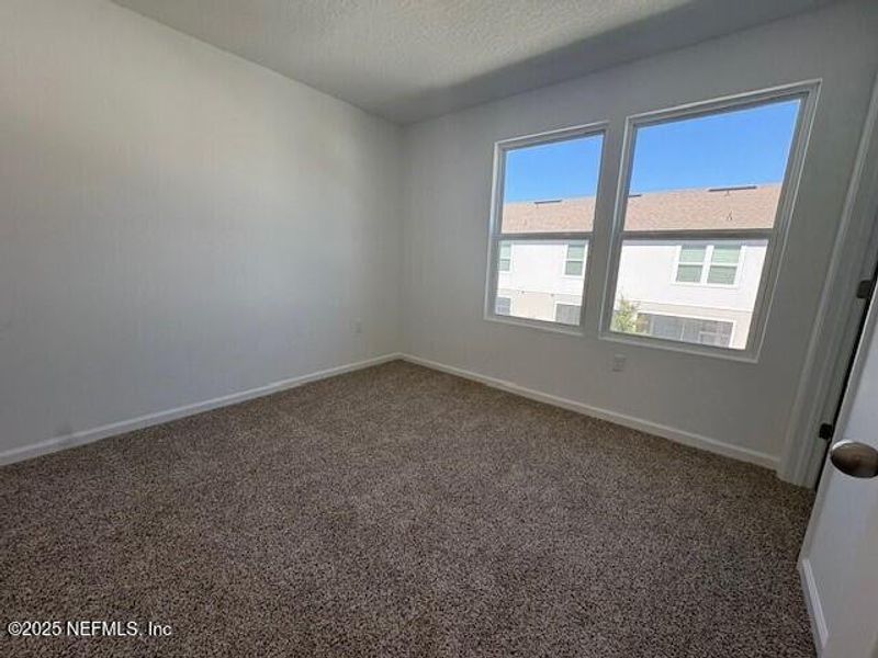 Spacious, unfurnished interior of a new home in Cordera Townhomes Express, St. Augustine (Image 19).