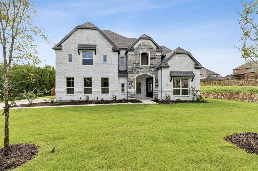 Front exterior of a new home in Westside Preserve, Midlothian, TX, highlighting curb appeal (Image 2). Front exterior of a new home in Westside Preserve, Midlothian, TX, highlighting curb appeal (Image 2).