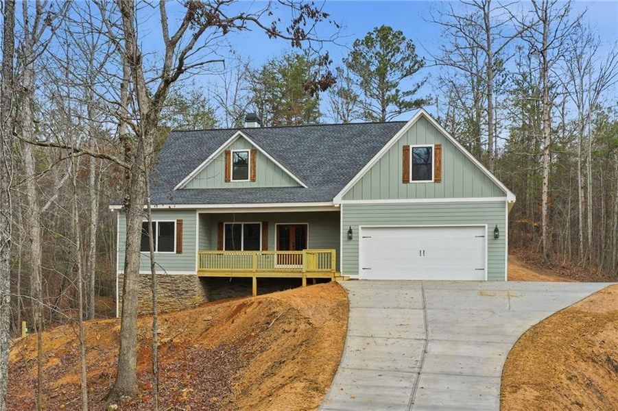Front exterior of a new home in , Ball Ground, GA, highlighting curb appeal (Image 1).