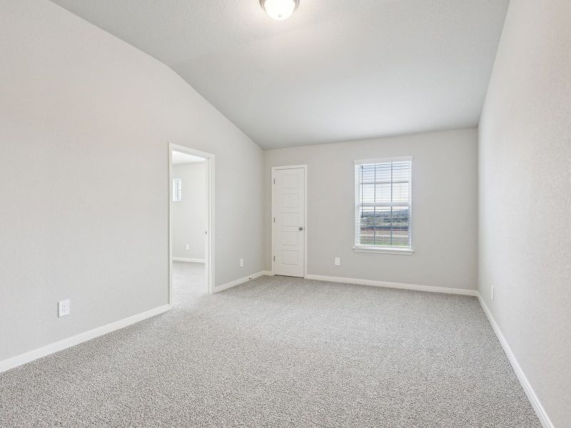 Guest bedroom in the San Jacinto floorplan at a Meritage Homes community.