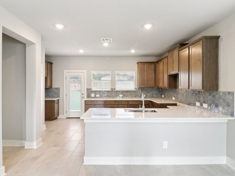 Furnished interior view inside a new home in Kallison Ranch, San Antonio (Image 8).
