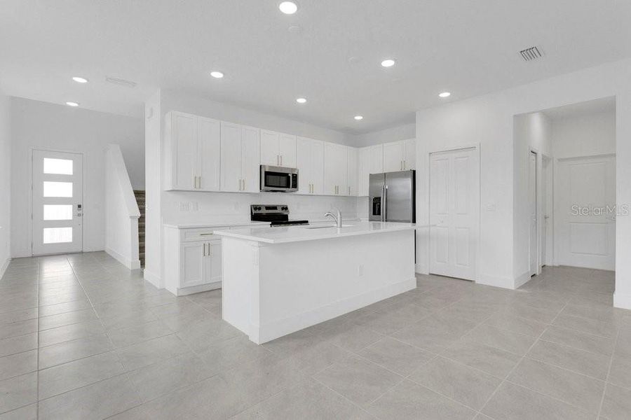 Furnished interior view inside a new home in Yucatan Gardens, Orlando (Image 6).