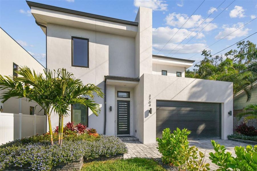 Front exterior of a new home in , Tampa, FL, highlighting curb appeal (Image 21).