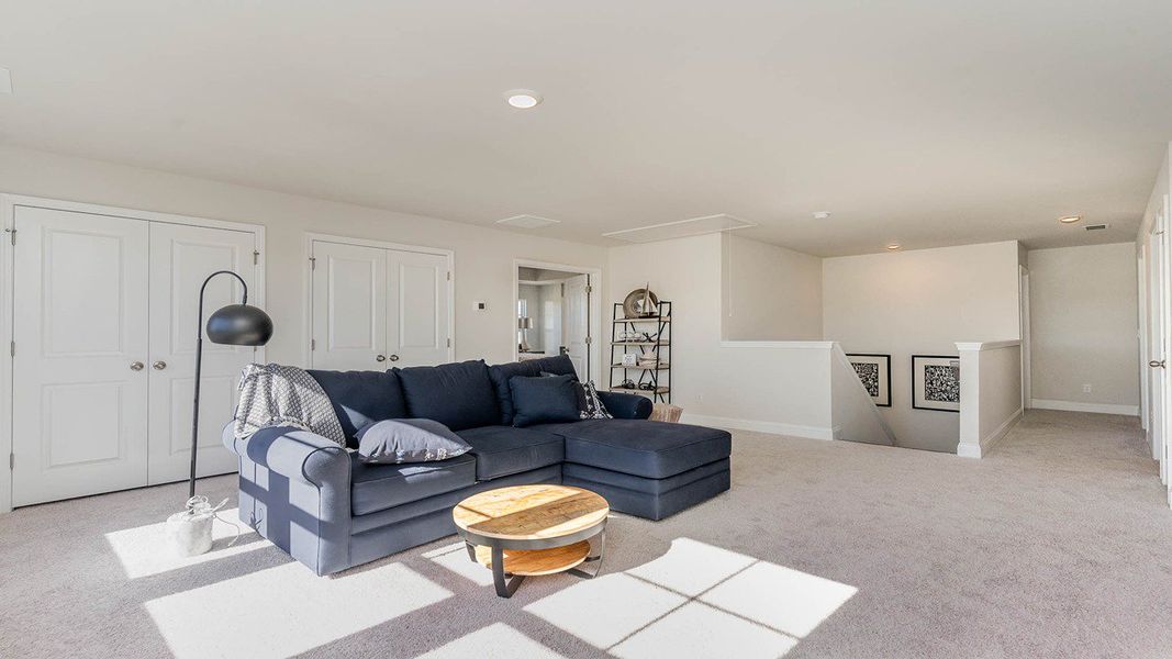 Representative furnished interior of a home built from the Harbor Oak by D.R. Horton in The Preserve at Shaftesbury Glen, Conway (Image 13).