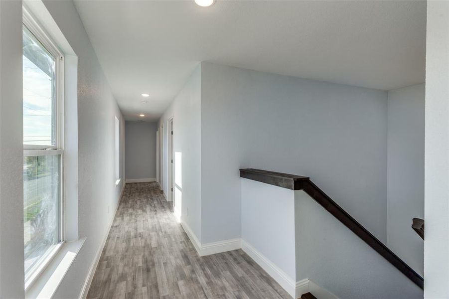 Hall with light wood-type flooring