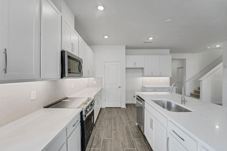 Furnished interior view inside a new home in Tuscan Hills, Dade City (Image 11).