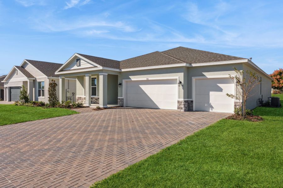 Representative exterior photo of a completed home built from the Aspen by Hartizen Homes in Eden Crest, Apopka, FL (Image 20).