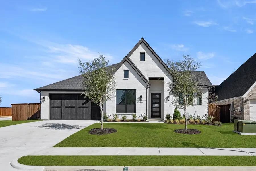 Front exterior of a new home in BridgeWater - Phase 1, Midlothian, TX, highlighting curb appeal (Image 1).