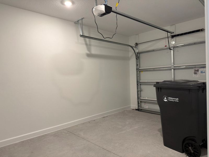 Surf plan features a 1-car garage