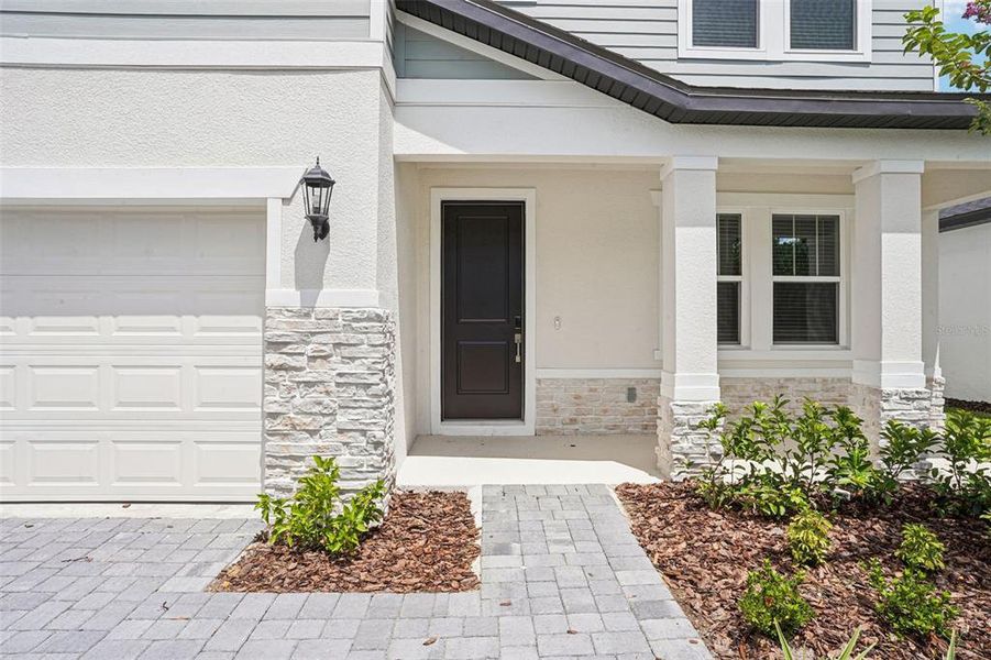 Exterior details and patio area of a home in Ridgehaven - Signature Series, Ormond Beach (Image 25).