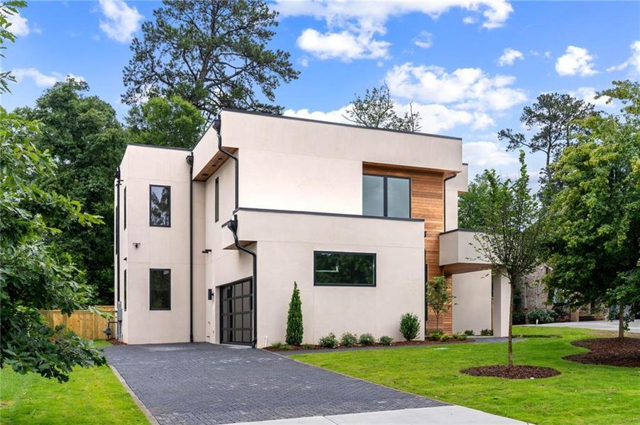 Front exterior of a new home in , Atlanta, GA, highlighting curb appeal (Image 1). Front exterior of a new home in , Atlanta, GA, highlighting curb appeal (Image 1).