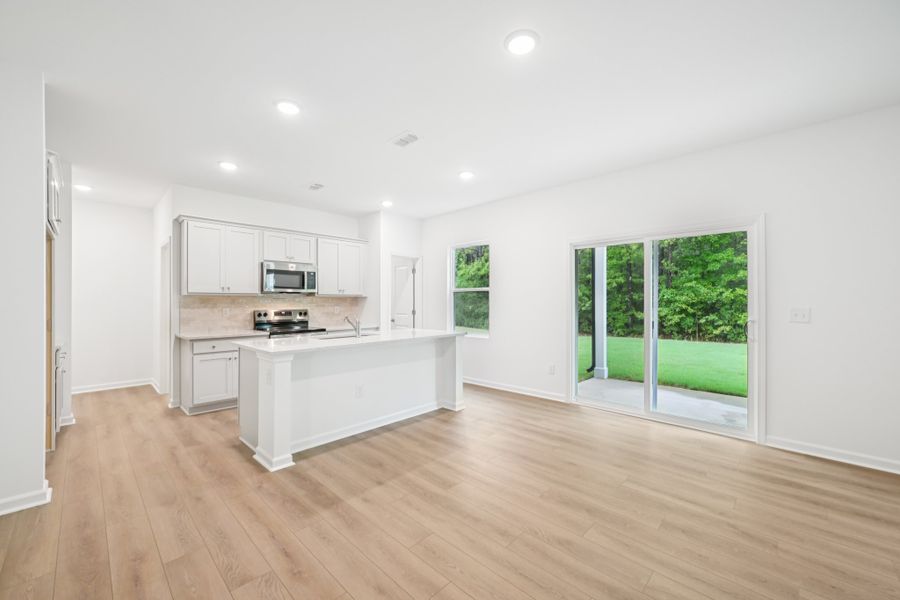 Representative furnished interior of a home built from the Brooke by Ashton Woods in Middleton Farms, Middlesex (Image 8).