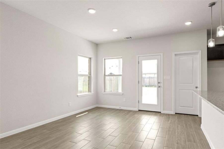 Spacious, unfurnished interior of a new home in Village at Manor Commons, Manor (Image 16).