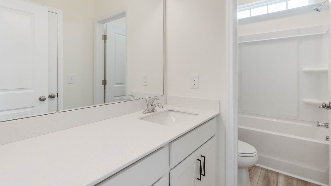 Stonehaven home plan with large vanity and shower Stonehaven home plan with large vanity and shower