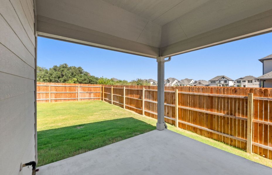 Exterior details and patio area of a home in Saddleback at Santa Rita Ranch, Liberty Hill (Image 24). Exterior details and patio area of a home in Saddleback at Santa Rita Ranch, Liberty Hill (Image 24).