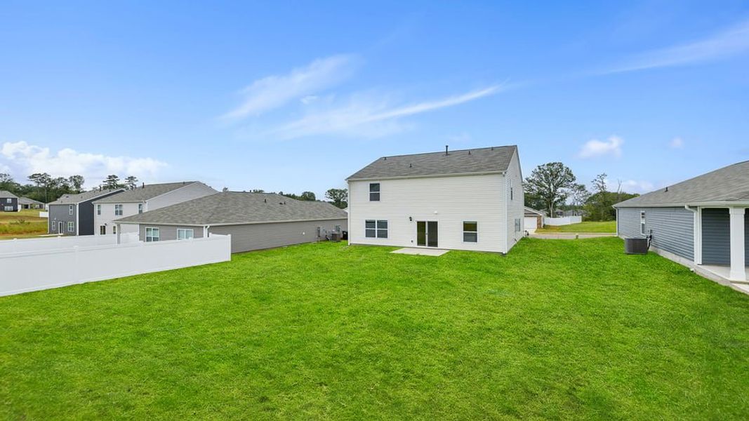 Exterior details and patio area of a home in Lakestone, Woodruff (Image 4).