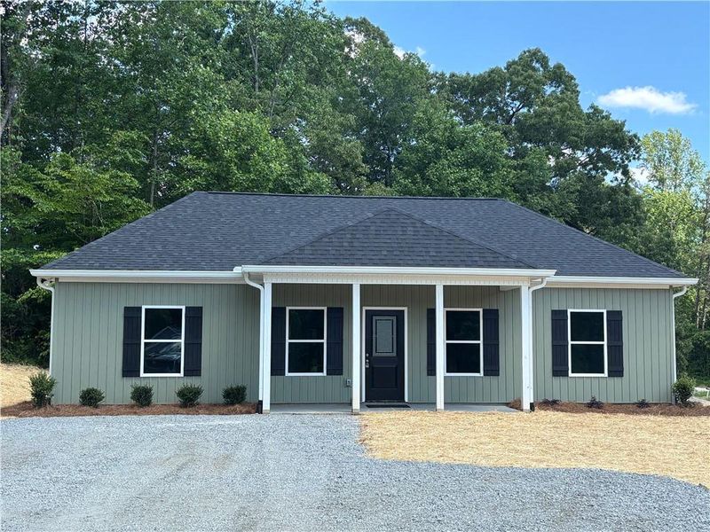 Front exterior of a new home in , Dahlonega, GA, highlighting curb appeal (Image 1). Front exterior of a new home in , Dahlonega, GA, highlighting curb appeal (Image 1).