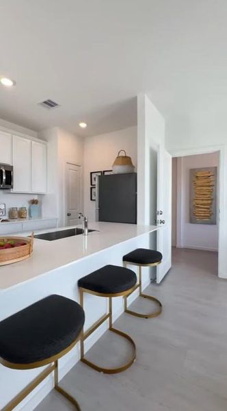 Pics are not of actual home.  They are a representative of a home of the same floor plan