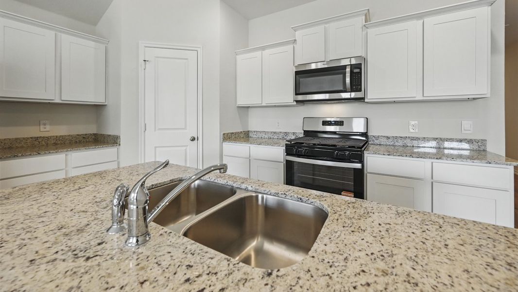 Furnished interior view inside a new home in Stonewyck Farms, Ennis (Image 12).
