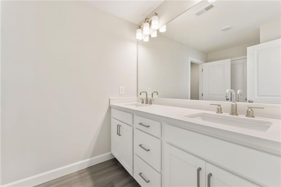 Furnished interior view inside a new home in Townes at South Main, Kennesaw (Image 4). Furnished interior view inside a new home in Townes at South Main, Kennesaw (Image 4).