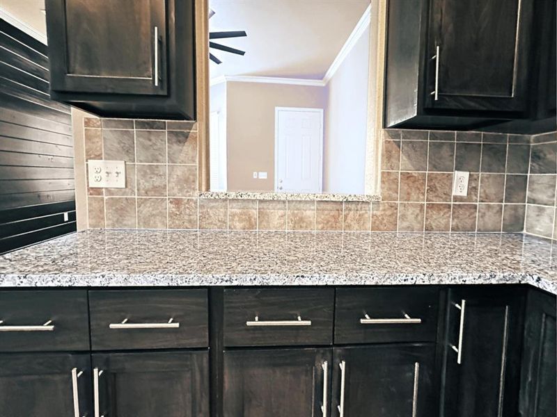 STUNNING granite, soft close custom cabinets