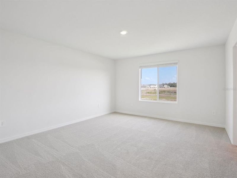 Spacious, unfurnished interior of a new home in Oakfield Trails - Premier Series, Parrish (Image 39).