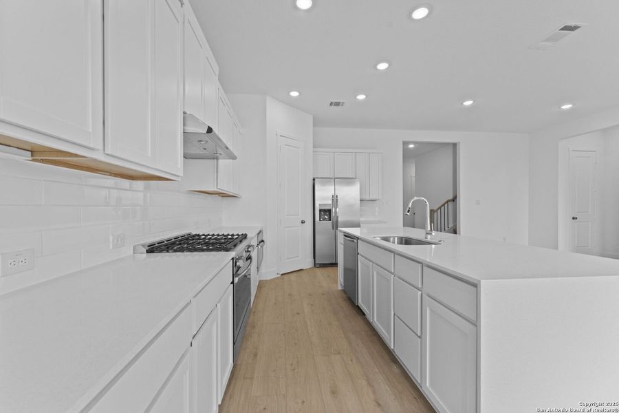 Furnished interior view inside a new home in , New Braunfels (Image 7).