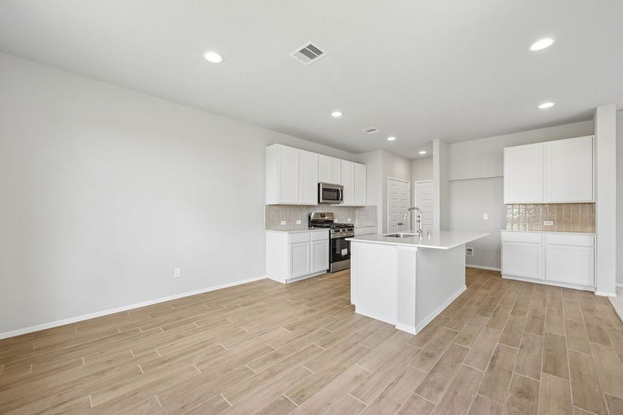Furnished interior view inside a new home in Azalea, Pattison (Image 6).