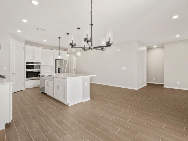 Spacious, unfurnished interior of a new home in Blossom Rock Reserve Series, Apache Junction (Image 11).