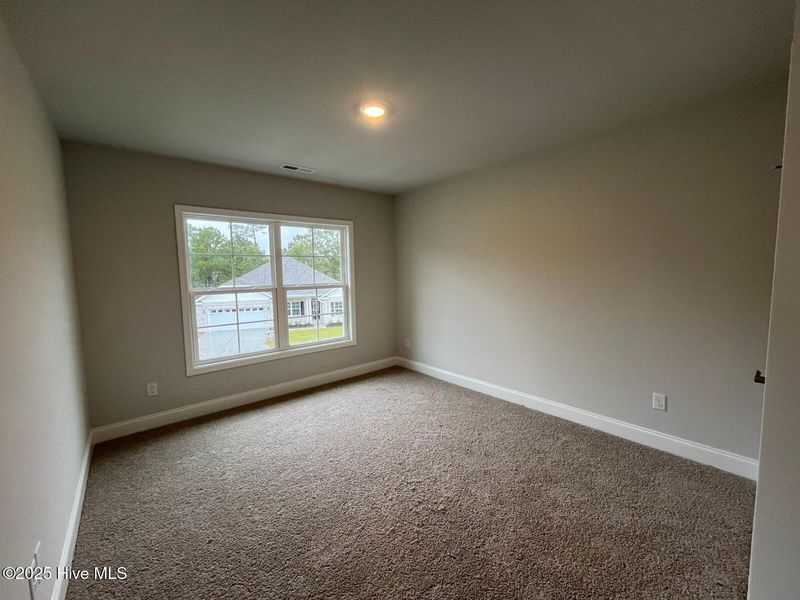 Spacious, unfurnished interior of a new home in Palmetto Creek, Bolivia (Image 32).