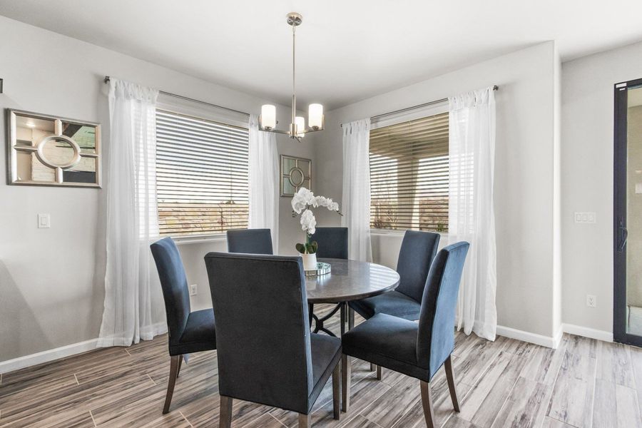 Representative furnished interior of a home built from the Valencia by Hakes Brothers in Hillside Park, El Paso (Image 11).