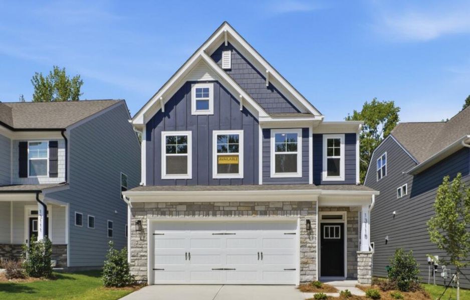 Front exterior of a new home in Caldwell Forest, Charlotte, NC, highlighting curb appeal (Image 2). Front exterior of a new home in Caldwell Forest, Charlotte, NC, highlighting curb appeal (Image 2).