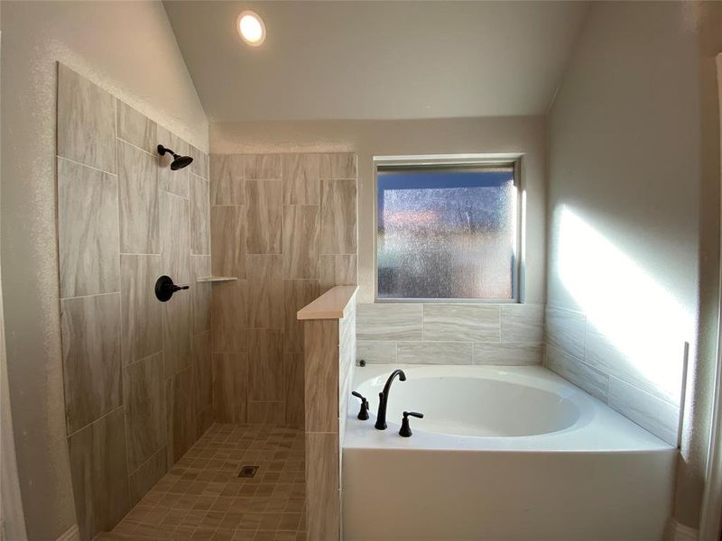 Master bath has separate garden tub & walk-in shower with tile pan will have frameless glass surround (not installed yet) Master bath has separate garden tub & walk-in shower with tile pan will have frameless glass surround (not installed yet)