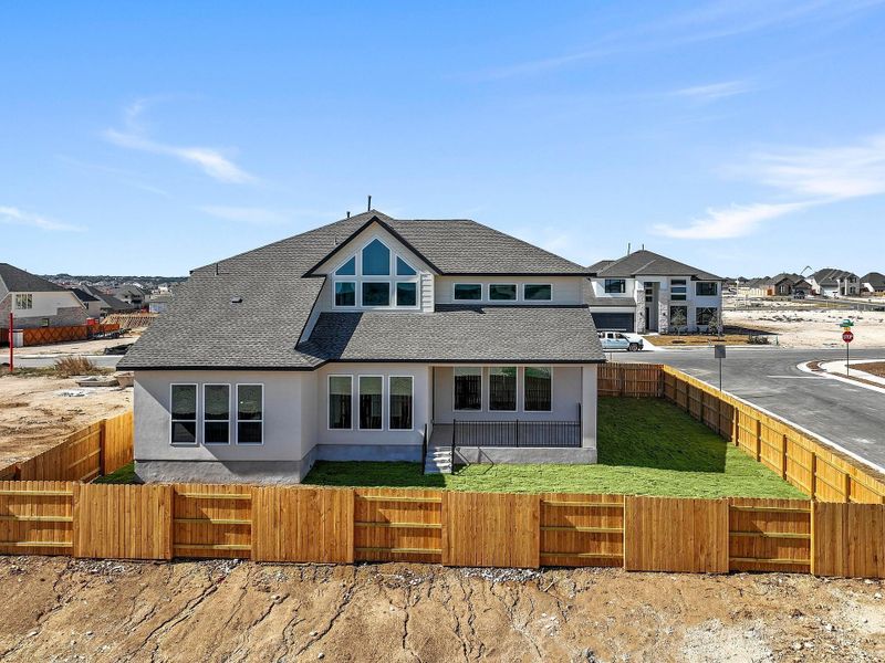 Exterior details and patio area of a home in Lariat, Liberty Hill (Image 24).
