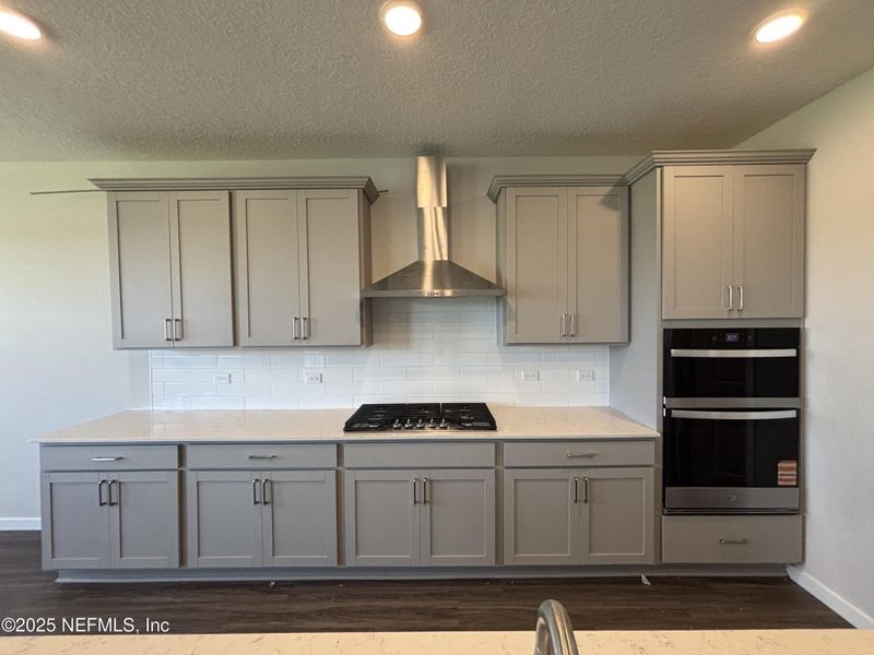 Furnished interior view inside a new home in The Cypress Series at Reserve East, Flagler Beach (Image 5).