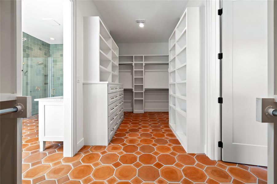 Walk in closet featuring light tile patterned flooring