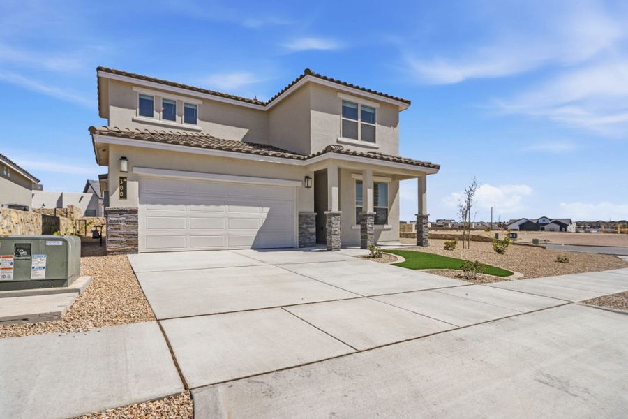 Front exterior of a new home in Emerald Estates, Horizon City, TX, highlighting curb appeal (Image 23).