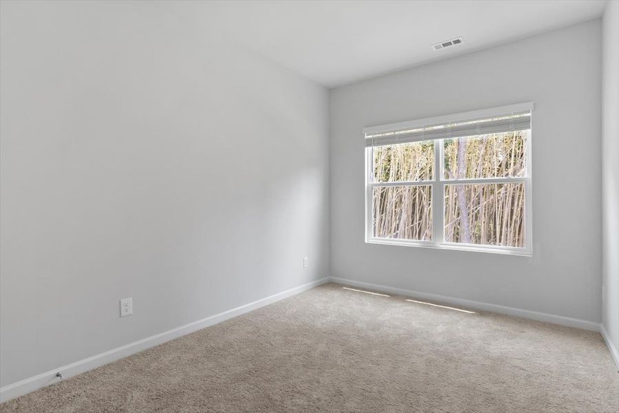 Spacious, unfurnished interior of a new home in West Main Townhomes, Sanford (Image 24).