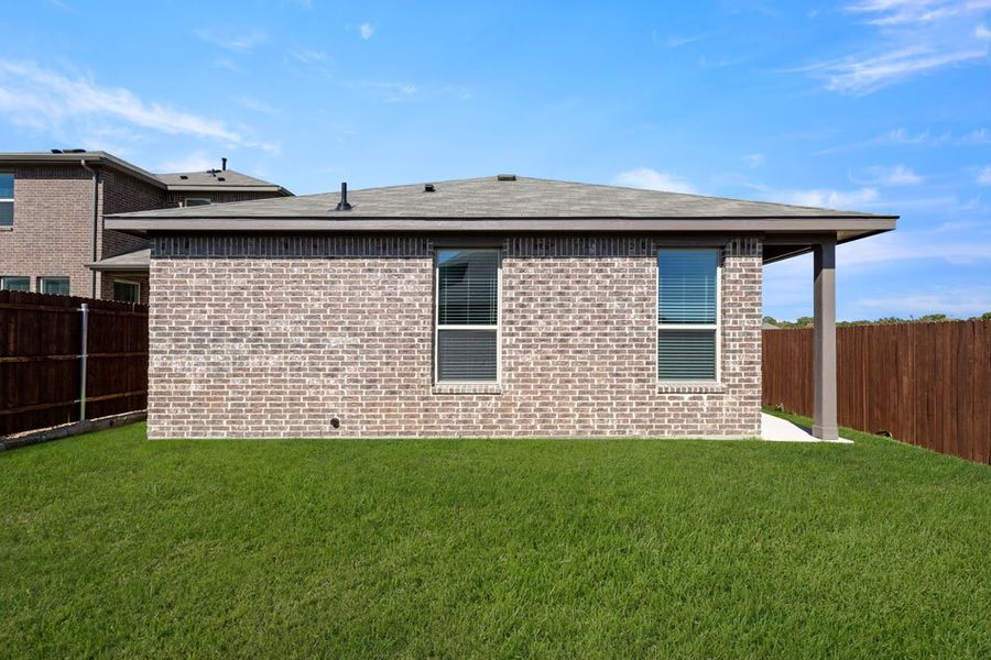 Representative exterior photo of a completed home built from the Cottonwood by Impression Homes in ValleyBrooke, Mesquite, TX (Image 25).