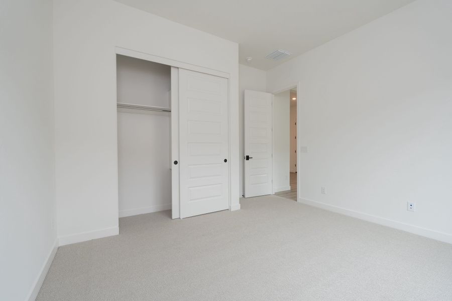 Spacious, unfurnished interior of a new home in Waterston Central, Gilbert (Image 12).