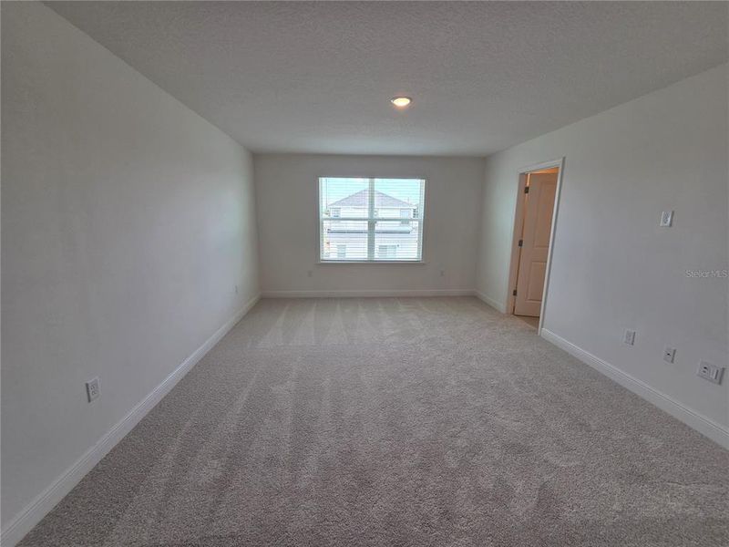 Spacious, unfurnished interior of a new home in Villamar, Winter Haven (Image 34).