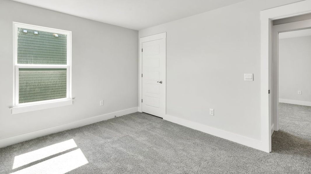 Spacious, unfurnished interior of a new home in Sidbury Station, Castle Hayne (Image 38).