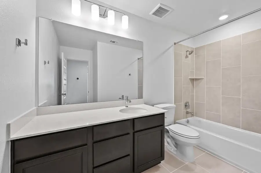 Furnished interior view inside a new home in Salerno - Classic Collection, Round Rock (Image 11). Furnished interior view inside a new home in Salerno - Classic Collection, Round Rock (Image 11).