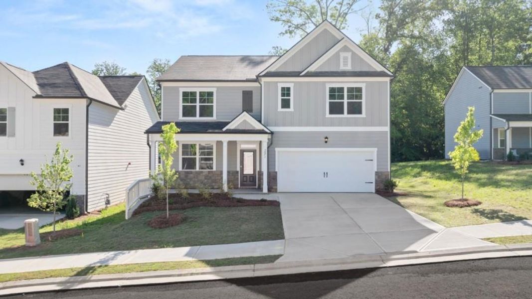 Front exterior of a new home in Creekview, Atlanta, GA, highlighting curb appeal (Image 1). Front exterior of a new home in Creekview, Atlanta, GA, highlighting curb appeal (Image 1).