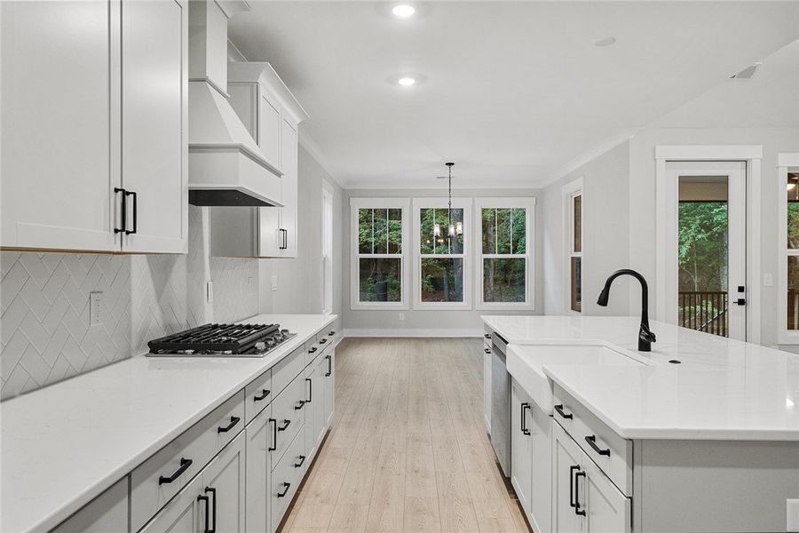 A contemporary kitchen offers a gas range, kitchen A contemporary kitchen offers a gas range, kitchen