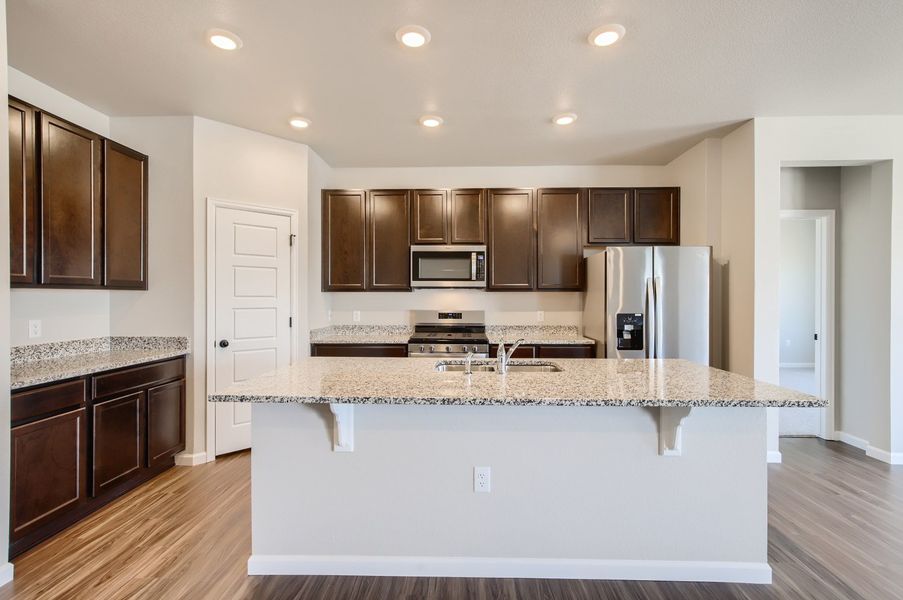 Kitchen of the ranch style Telluride plan by Century Communities