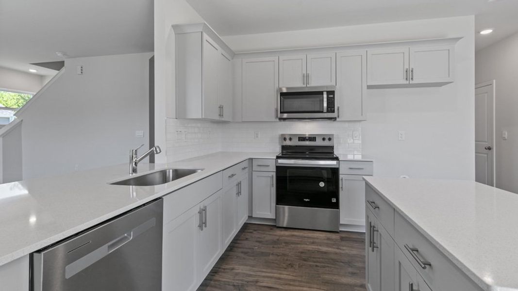 Representative furnished interior of a home built from the WILMINGTON by D.R. Horton in Swift Creek Farm, Clayton (Image 11).